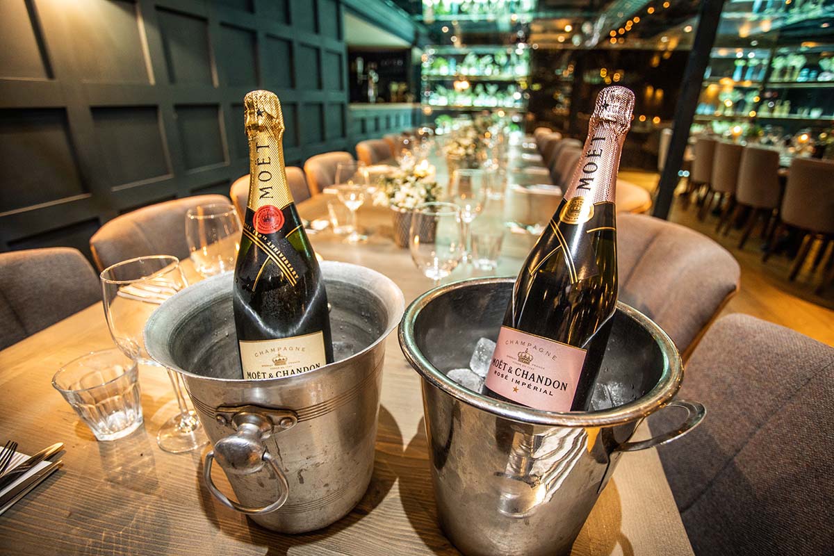 champagne bottles in a bucket in the private dining room