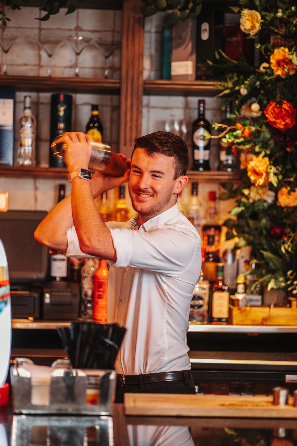 Man shaking a cocktail